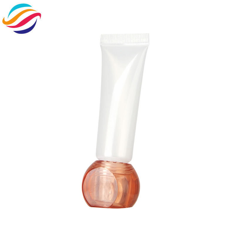 Faceted ball cap lip gloss tube view 1