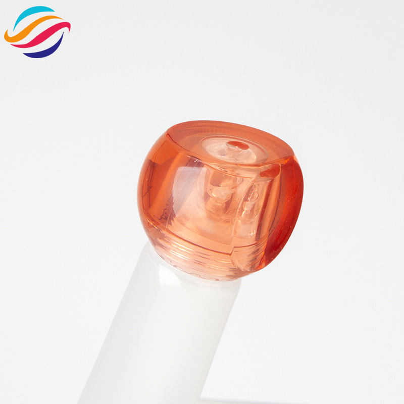 Faceted ball cap lip gloss tube view 2