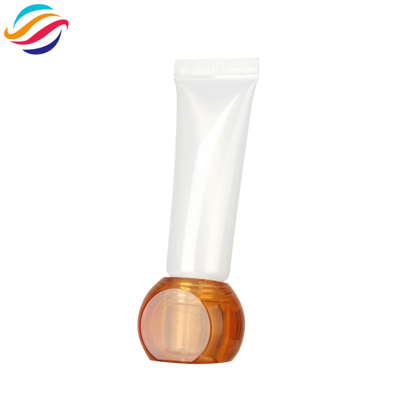 Faceted ball cap lip gloss tube view 8